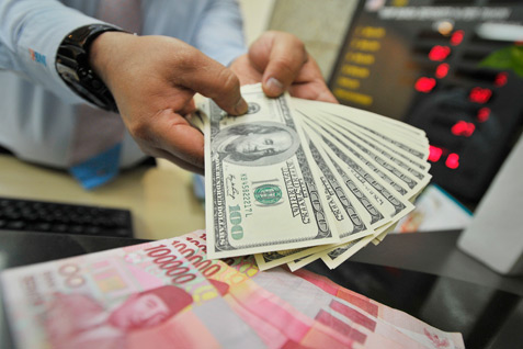Rupiah Menguat 0.05 Persen, Dolar AS Melemah Akibat Inflasi